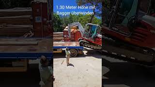 Bagger Auf Anhänger Laden