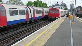 London Underground District and Piccadilly Line Trains At Ravenscourt Park 7 May 2019