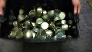 Cans rattling in box