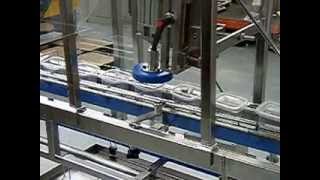 Riggs Autopack Ltd - Automatic Lid Pressing Machine