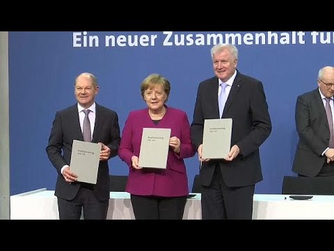 Angela Merkel says “it’s time to start work”