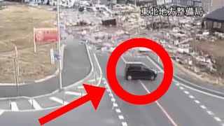 Car escapes Japan tsunami 2011 footage from CCTV cameras