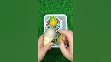 Sorting M&M’s by colors. Watch how colorful sweets turn into a beautiful pattern.