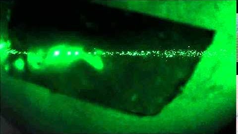 1 Particle splits into 2 - Laser Trapping in Air