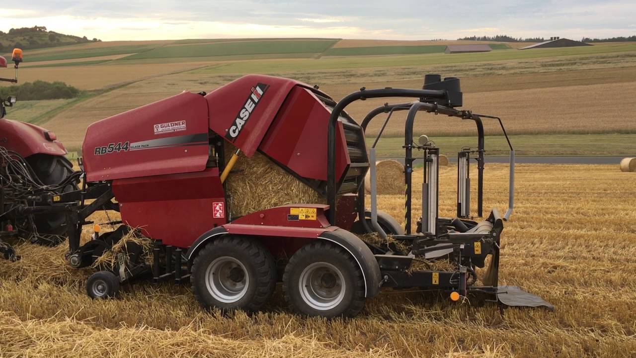 CASE IH RB544 Press Wickel-Combi im Stroh mit Puma CVX 230