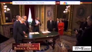 President Obama catches Sen. Harry Reid stealing a pen