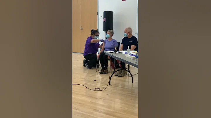 Dick and Mary Becker Receive Their First Dose of t...