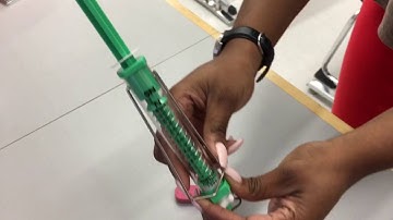 Using a spring scale