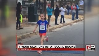 7-year-old runs into record books
