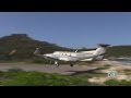 Pilatus pc12 low over beach landing st barths