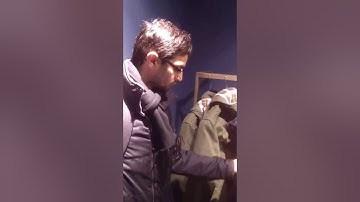 Buying a coat at Marc O