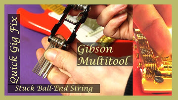 String Stuck In Guitar Bridge