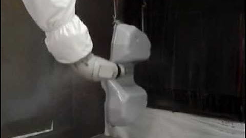 Motoman PX2850 robot painting automotive fuel tank