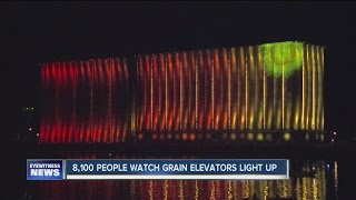 8100 people watch grain elevators light up