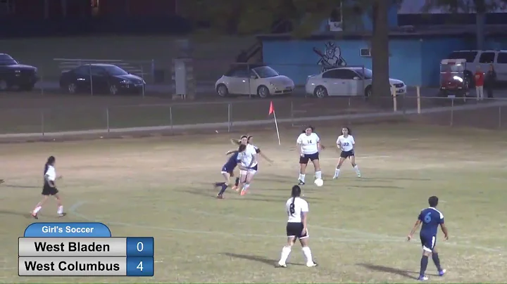 WCHS Soccer -Emily Faulk pushes through the defens...