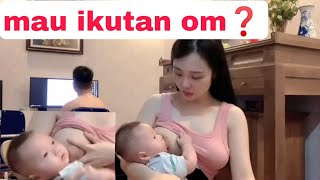 mamah muda cantik menyusui bayi