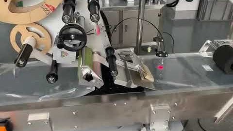 Bag labeling machine:New arrival plastic bag labeling machine