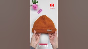 Verander een ondraagbare trui in een muts die zowel stijlvol als warm is.