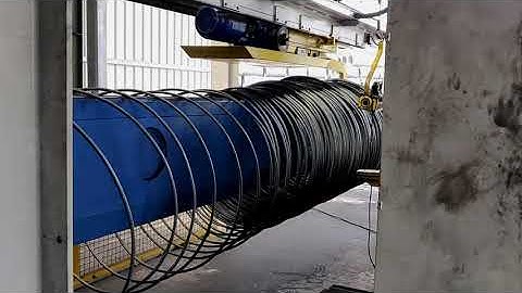 Stretching and respooling line STR with horizontal pay-off system HPS