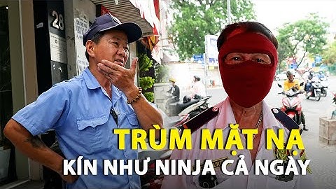 Mưu sinh dưới nắng nóng TP.HCM, người bảo vệ già trùm mặt nạ kín như Ninja cả ngày trời