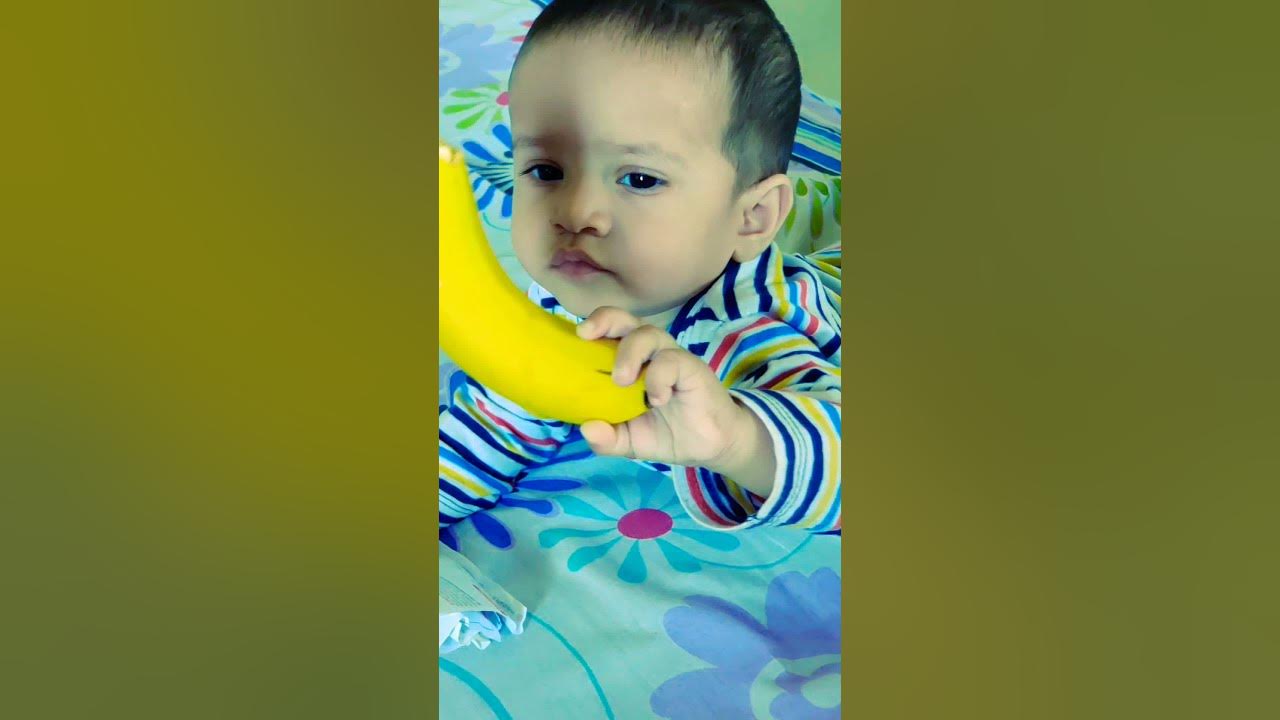 8-month-baby-eating-banana-should-banana-be-given-to-6-month-old