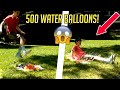 JUMPING ON 500 WATER BALLOONS!
