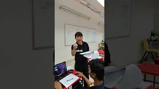 Snitching on a Student Playing Game in Class