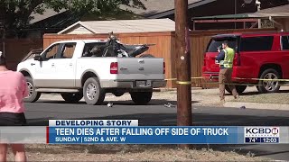 15-year-old dies after falling off side of truck