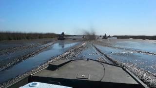 Go-Devil surface drive blowing through mud.