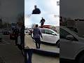 Man Jumps on Stranger’s Car and Won’t Come Down