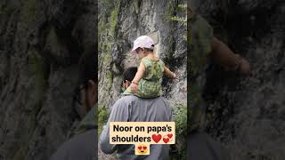 Noor is enjoying fathers shoulder ride??