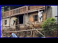 Workers worked hard to renovate a rotten old 2-story house