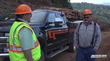 This Madill 3800C Log Loader from Modern Machinery Keeps Rice Logging, Inc. Productive