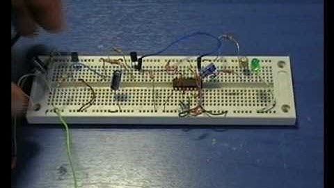 An AC Hum Touch Button