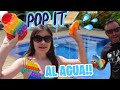 LOS MEJORES FIDGETS TOYS ! EN BUSCA de los POP IT 💦 EN LA PISCINA  El juego de burbujas mas viral