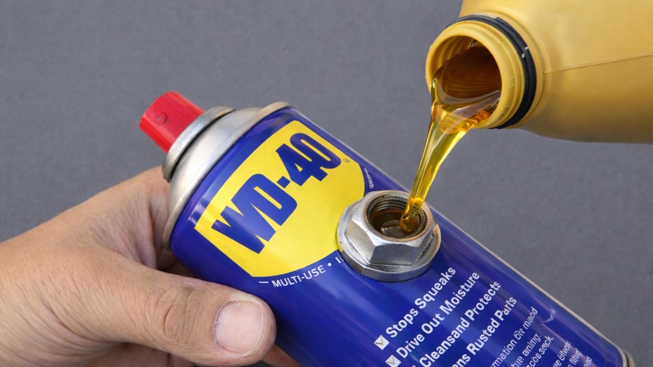 Easy way to refill an empty WD 40 can that few people know