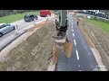 Filling Road Shoulder With Gravel Using A Tiltrotator