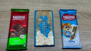 Satisfactory video.ASMR unpacking Nestle hazelnut, Kazakhstan and Nestle milk chocolate