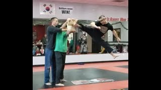 Blind Folded Jump Spin Hook Kick Breaking 2 Wooden Boards