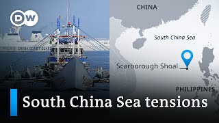 Philippines send fishing vessels to Chinaclaimed Scarborough Shoal | DW News