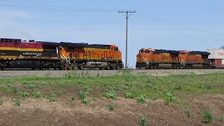 BNSF Barstow Sub WB manifest with military vehicles meets EB stack at Linroth April 30, 2024