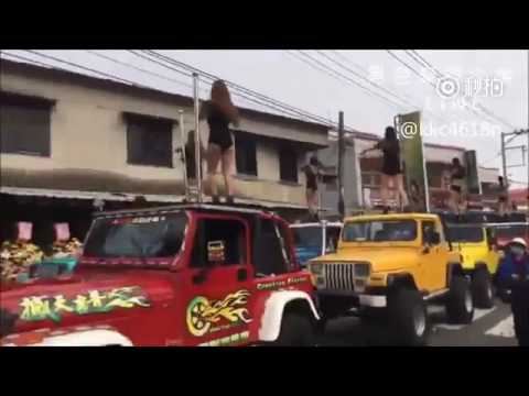 50 scantily-clad ladies pole dance atop jeeps for Taiwanese official&#039;s funeral