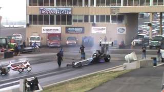 10,000 hp Top Fuel dragster burnout blows engine