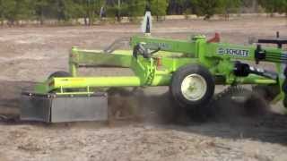 Easy way to pickup roots, stumps and chunks with a Schulte SRW1400 Windrower & RS320 Rock Picker