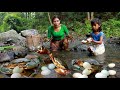 Mother with daughter found catch big crabs and pick duck eggs near river -Cooking eating delicious