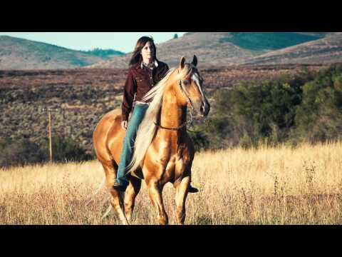 George Strait. "How Bout Them Cowgirls"