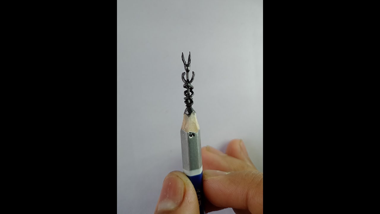 Carving Caduceus on the graphite of a pencil : tribute to front line medical workers