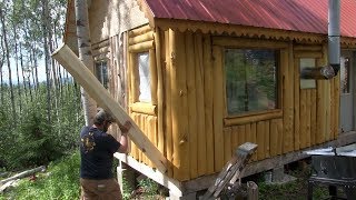 Alaska Log Cabin Project .....putting in the final logs