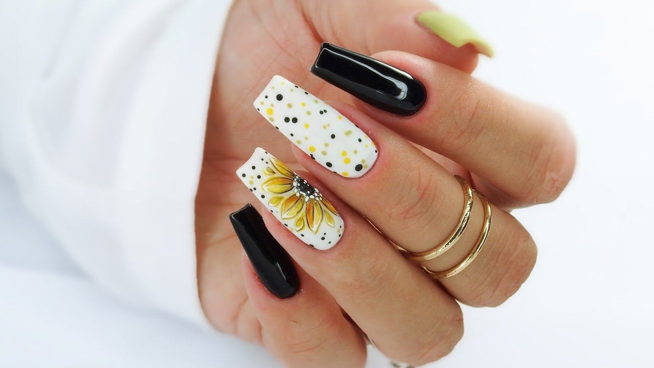 3. Simple Sunflower Nail Art for Short Nails - wide 2