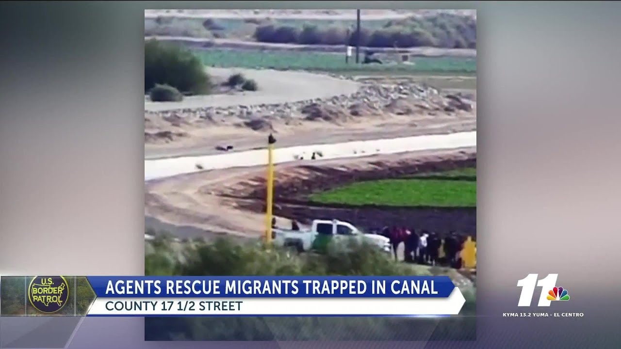 agents rescue migrants trapped in canal - YouTube